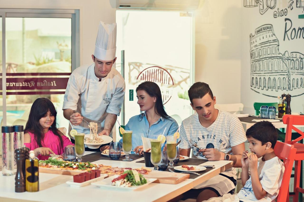 Sealine Beach, a Murwab Resort Mesaieed Exterior foto Family dining at a restaurant